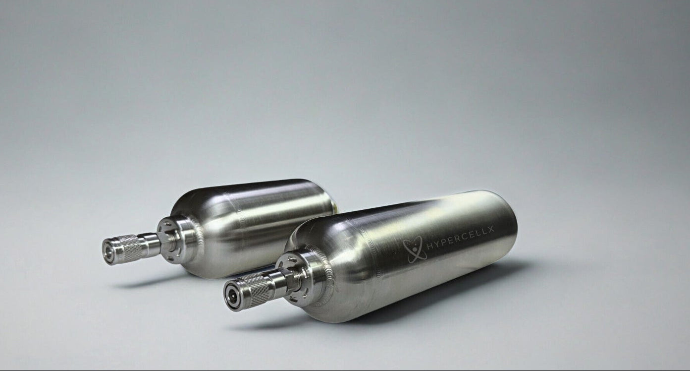 Two metallic fuel tanks on a gray background